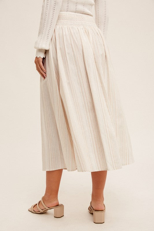 Load image into Gallery viewer, PREMIUM LINE | BUTTON FRONT SMOCKED BACK MULTI STRIPED MIDI SKIRT
