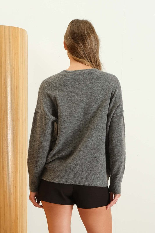 CREWNECK FRONT SEAM KNIT SWEATER