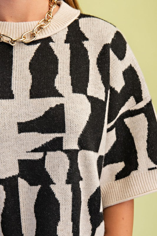 THE GEOMETRIC SHORT SLEEVE SWEATER TOP