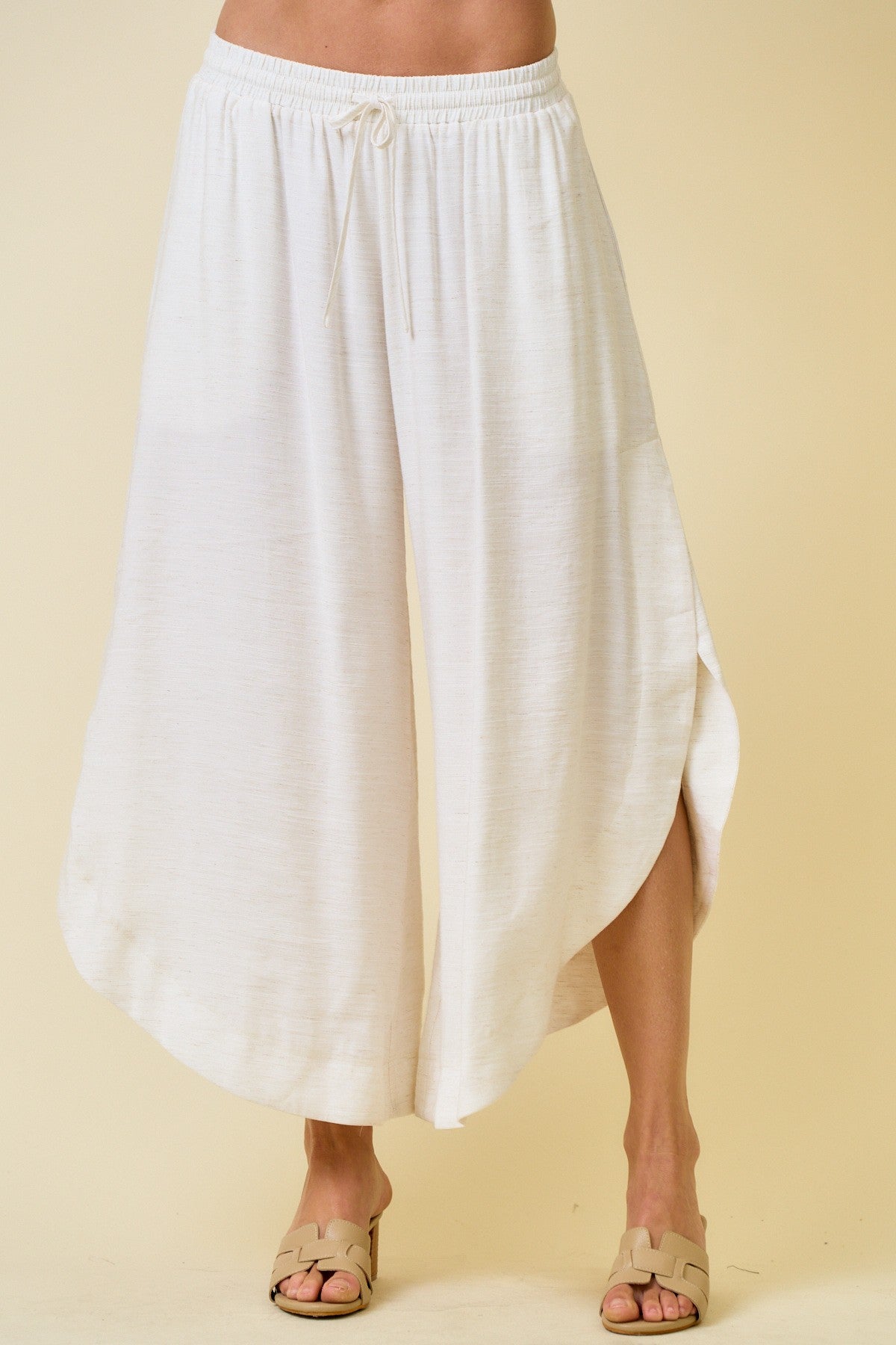 THE ROUNDED HEM SPLIT PANTS