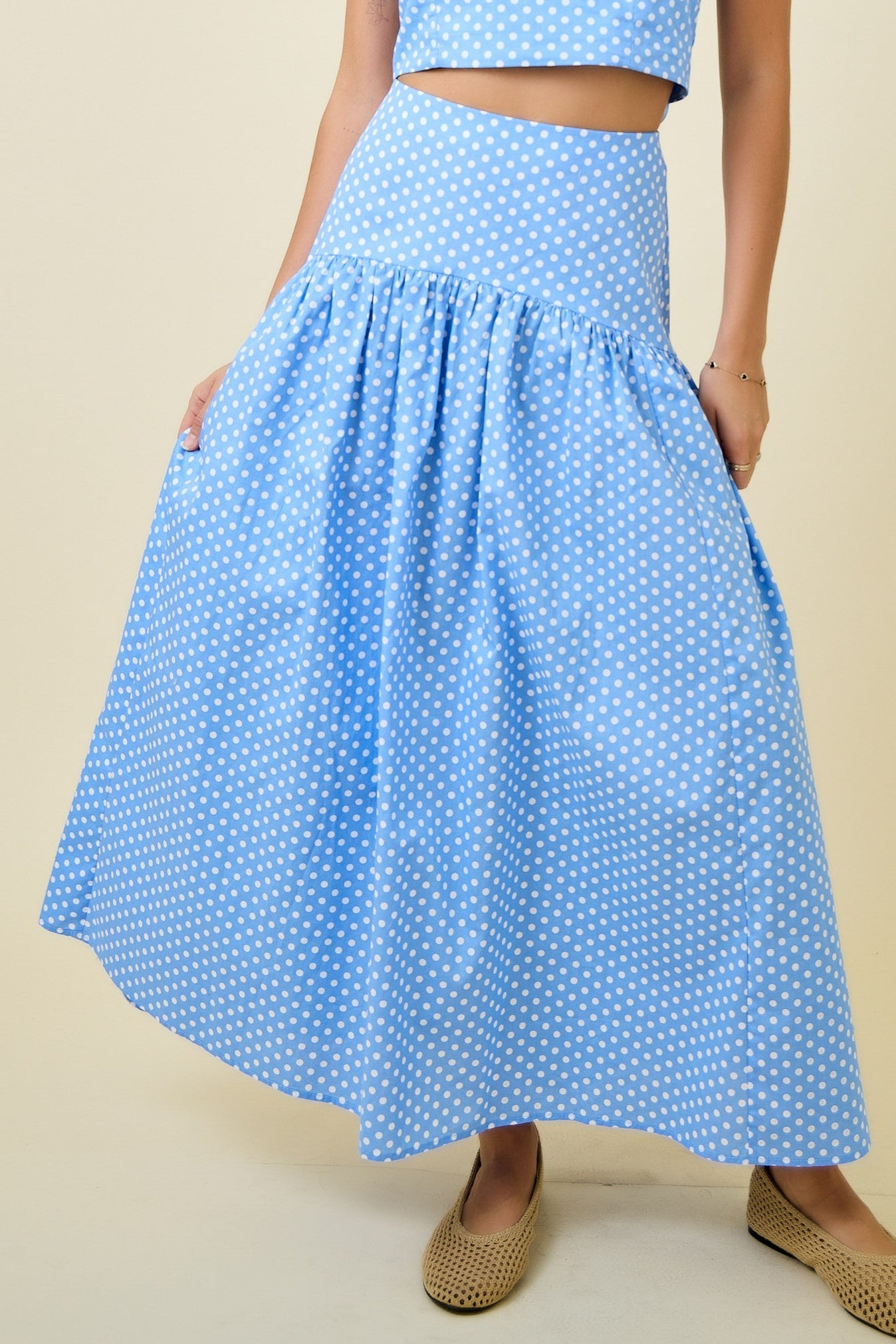 POLKA DOT FLARED MAXI SKIRT WITH CURVED YOKE
