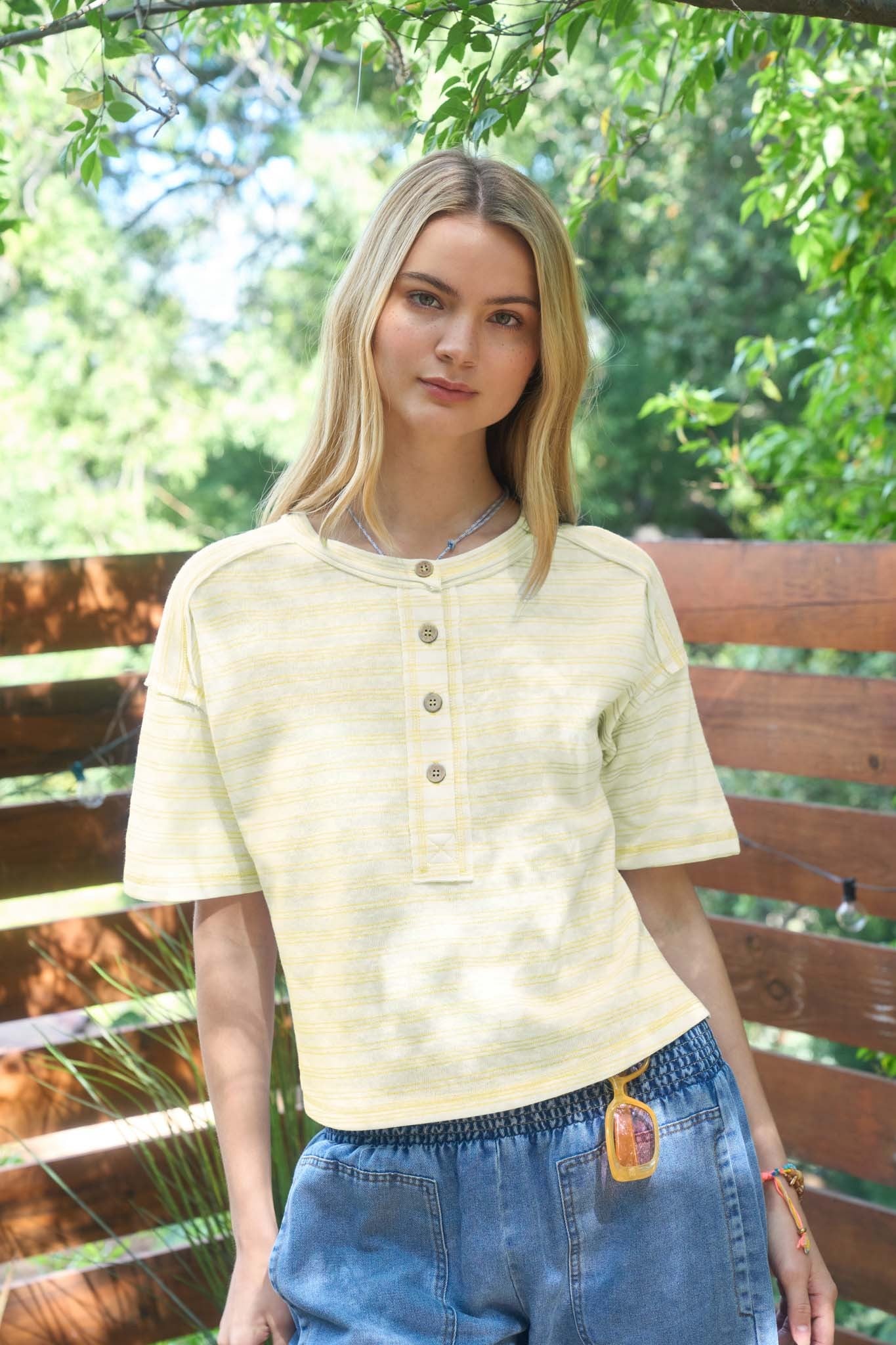 STRIPE EXPOSED SEAM HENLEY BOXY KNIT TOP