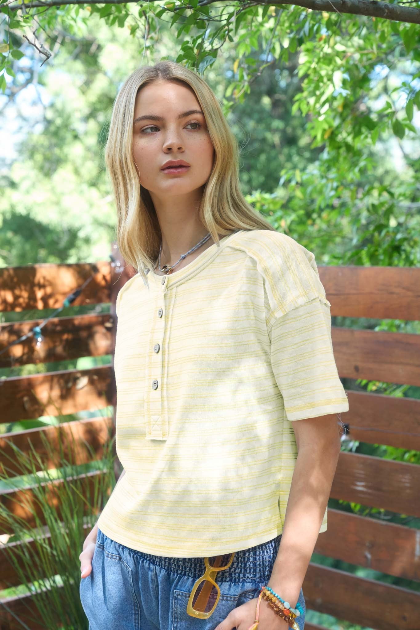 STRIPE EXPOSED SEAM HENLEY BOXY KNIT TOP
