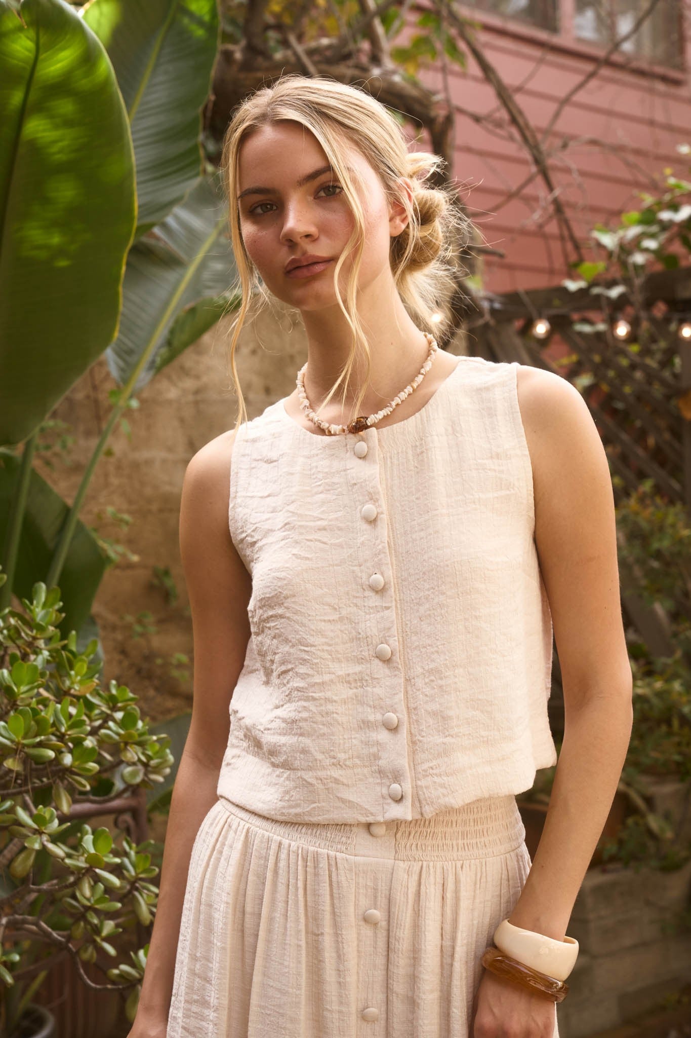 THE TEXTURED BUTTON DOWN SLEEVELESS TOP