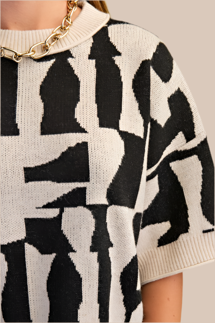 THE GEOMETRIC SHORT SLEEVE SWEATER TOP