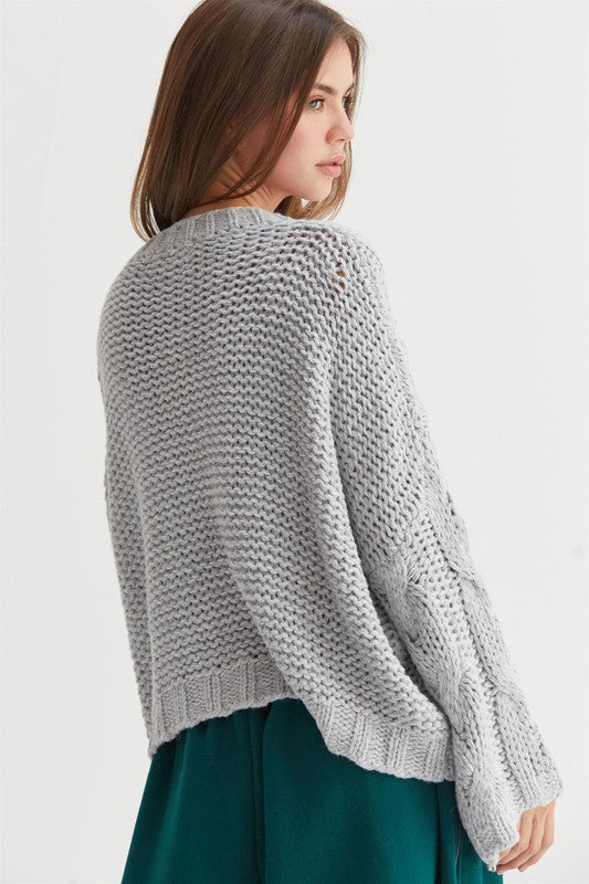 CABLE KNIT OVERSIZED SWEATER