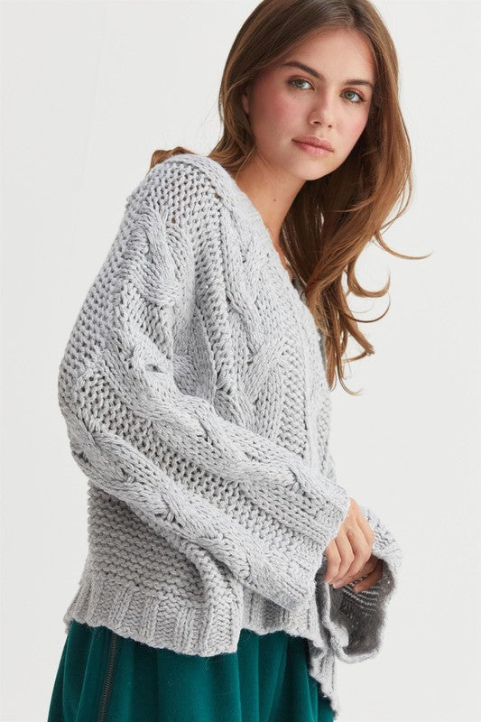 CABLE KNIT OVERSIZED SWEATER