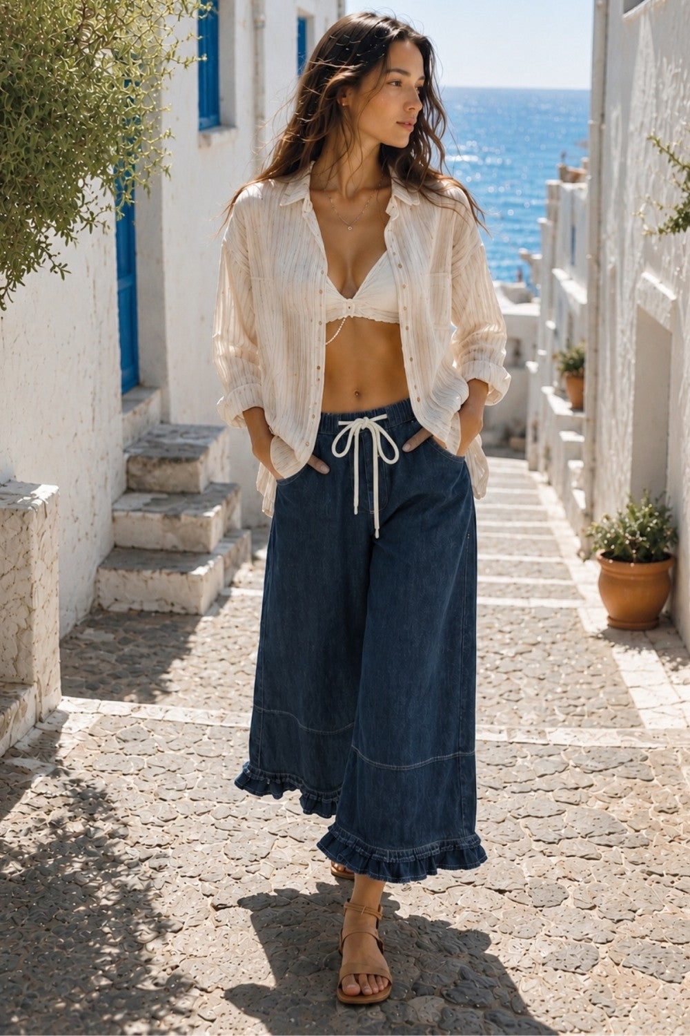 THE COSTA FRILL DENIM PANTS