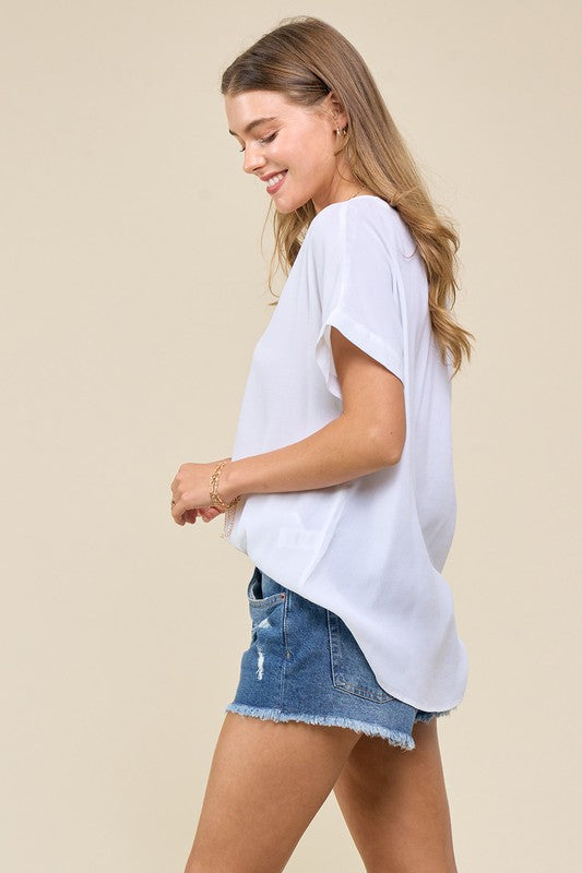 THE WHITE BLOUSE