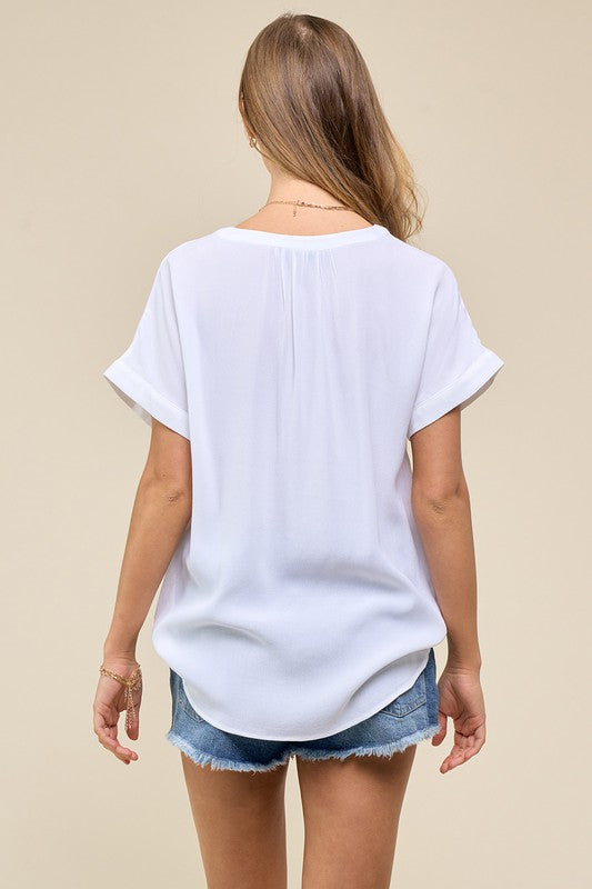 THE WHITE BLOUSE